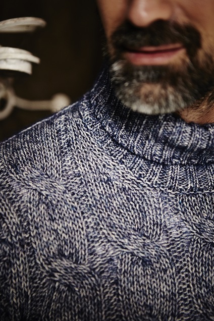 Detail of the wool and silk moulinè cable turtleneck